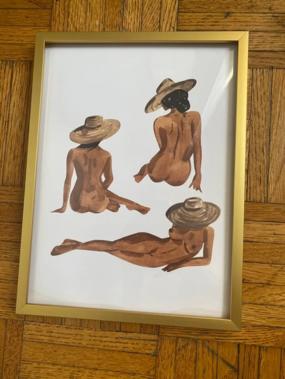 Fashion-Inspired Watercolor Painting of Women Wearing Raffia Hats in Gold Frame